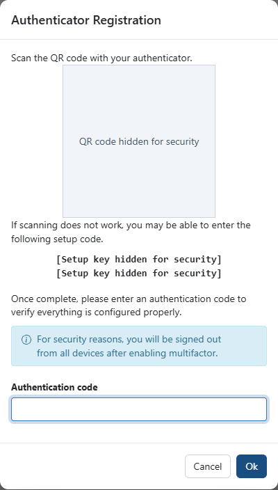 Authenticator Registration dialog with QR code and setup key hidden for security
